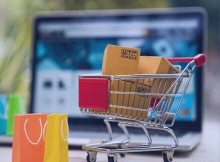 Featured image of shopping cart against computer screen